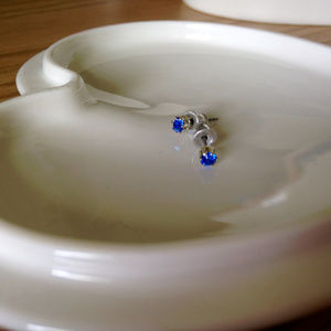 Tiny blue studs with silver backing